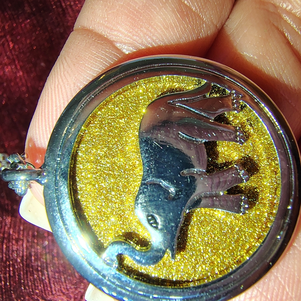 Gold and Silver Elephant Pendant